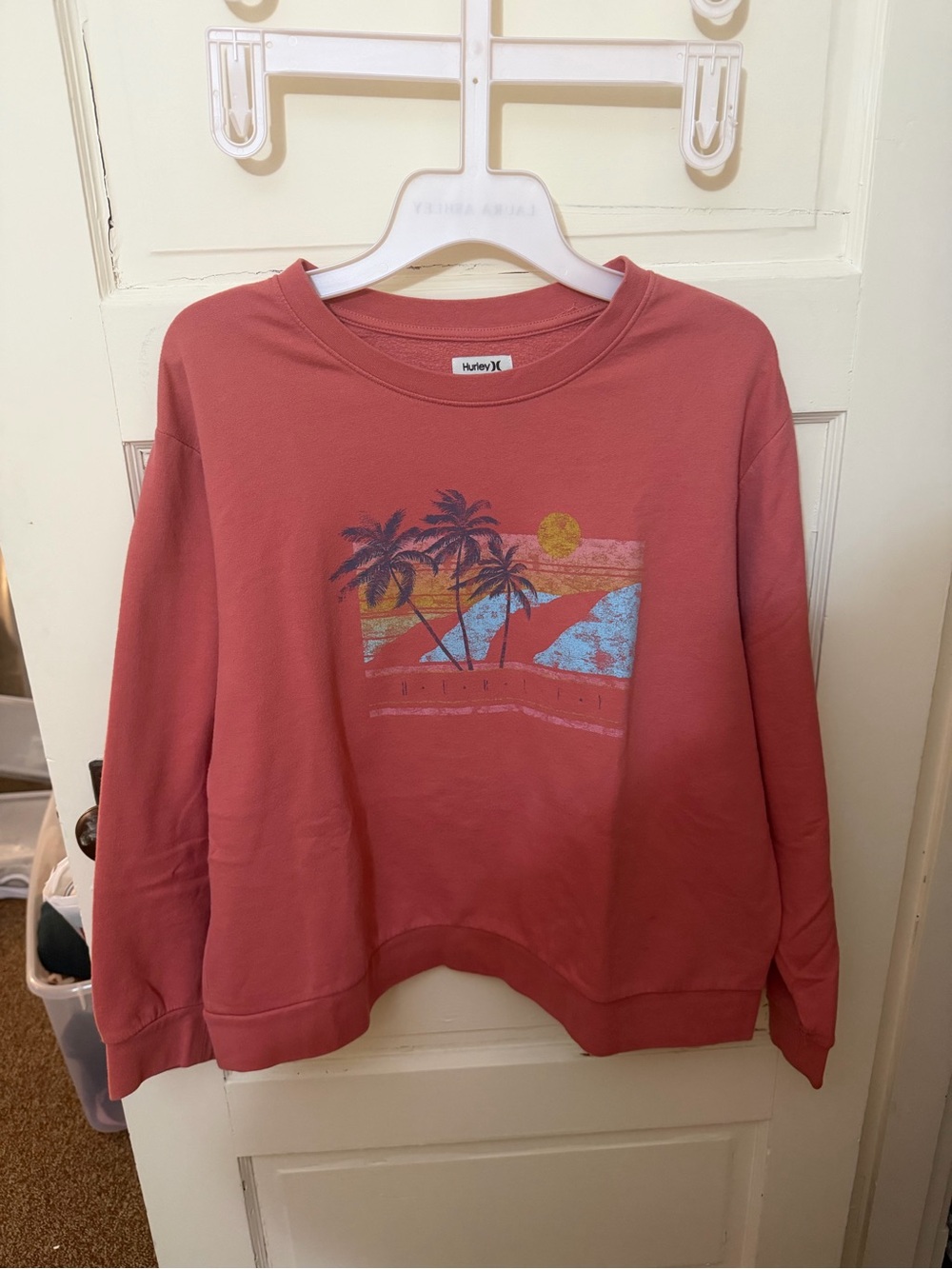 Pink Hurley sweatshirt with palm trees and sunset